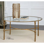 Table basse ovale à plateau en verre clair et doré, pieds en métal, 1 pièce